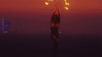 Fire performer at dusk